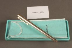 Tiffany & Co. sterling silver pen in original box and felt pouch.