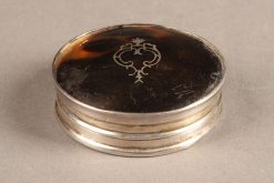 English snuff box made from tortoise shell and sterling silver, circa 1925.