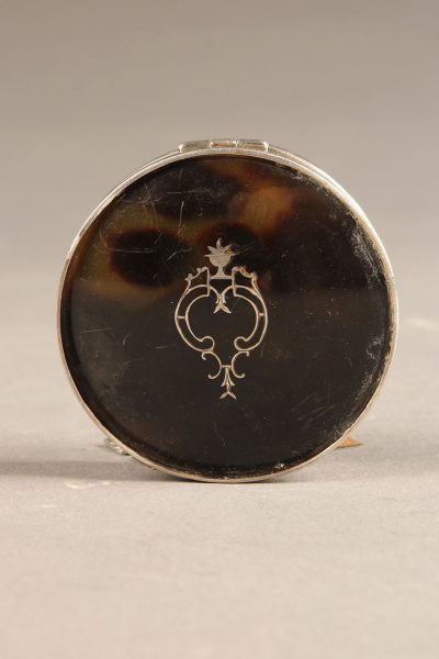 English snuff box made from tortoise shell and sterling silver, circa 1925.