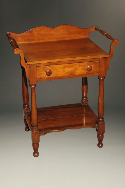 Beautiful cherry American Victorian era wash stand with drawer and towel bars, circa 1870.