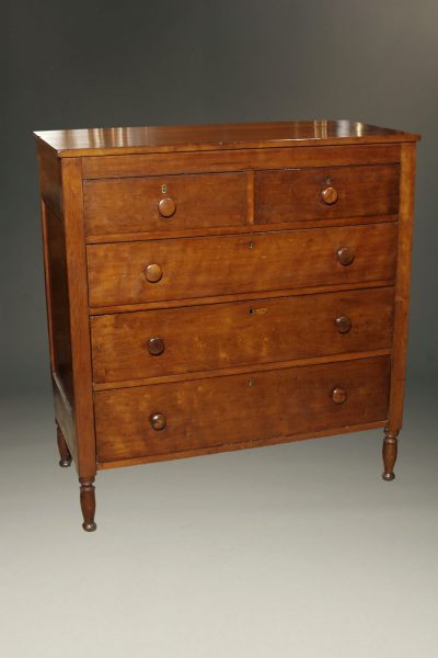Early 19th century American Sheraton style chest of drawers in cherry, circa 1820-30.
