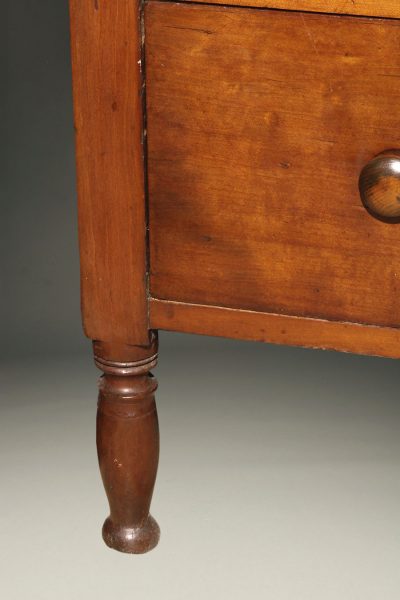 Early 19th century American Sheraton style chest of drawers in cherry, circa 1820-30.