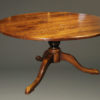 60" round custom English pedestal table in cherry wood.