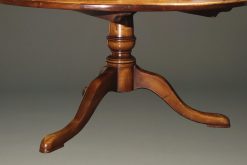 60" round custom English pedestal table in cherry wood.