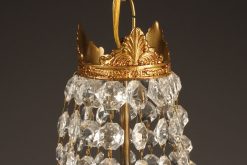 Small single light bronze and crystal French chandelier, circa 1890.