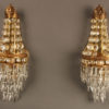 Beautiful pair of petite bronze and crystal French sconces.