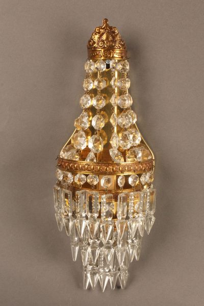 Beautiful pair of petite bronze and crystal French sconces.