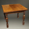 Late 19th century English oak drawleaf pub table, circa 1890-1900.