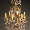 Late 18th century French 12 arm iron and crystal chandelier, circa 1790.