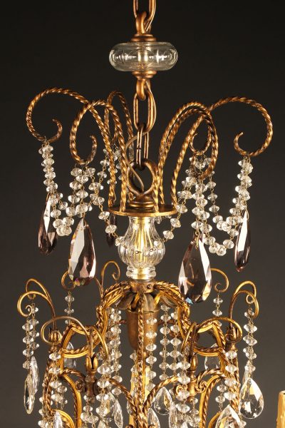 Late 18th century French 12 arm iron and crystal chandelier, circa 1790.