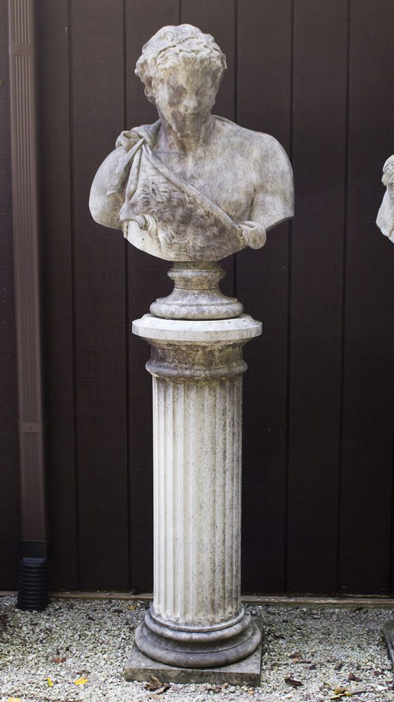 English cast limestone bust of Bacchus atop a classically styled column