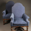 Pair of mid 19th century English arch back armchairs with nicely carved stretcher, circa 1850.