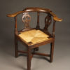 18th century English oak corner chair with rush seat, circa 1760-80.