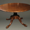 18th century styled custom oak pedestal table with a 54" diameter top.