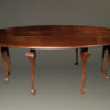 Mahogany Irish wake table with double drop leaves and gatelegs with hand carved ball and claw feet.