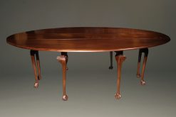 Mahogany Irish wake table with double drop leaves and gatelegs with hand carved ball and claw feet.