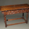 Custom English Jacobean style side draw leaf table in oak.