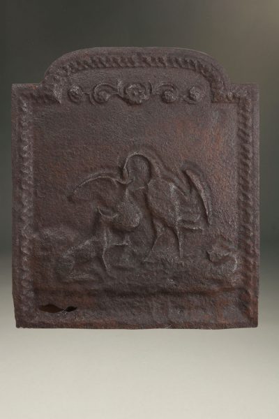 Early 18th century Flemish fireback depicting a swan and fox, circa 1700-30.