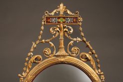 Beautiful pair of oval, Adams style English mirrors with very nice gilded hand carvings, circa 1920's.