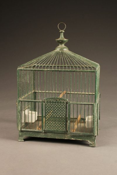 Late 19th century French green wire finch cage with milk glass feeder and bowl