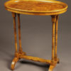 Very nice drinks table with oval top and signed Baker, circa 1920's.