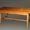 Custom French farmhouse table with stretcher made in solid cherry