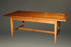 Custom French farmhouse table with stretcher made in solid cherry