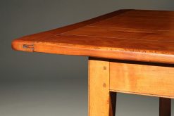 Custom French farmhouse table with stretcher made in solid cherry