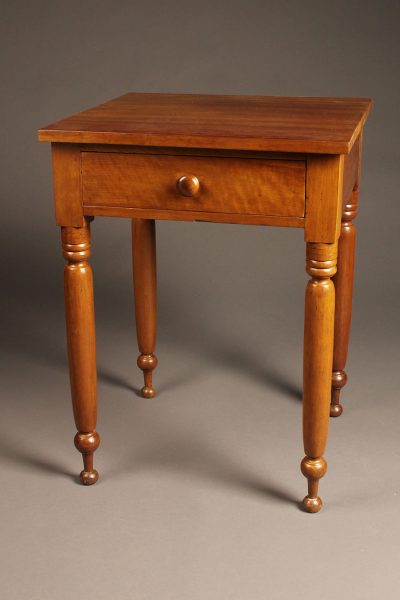 Very nice late 19th century cherry stand table with drawer and turned legs