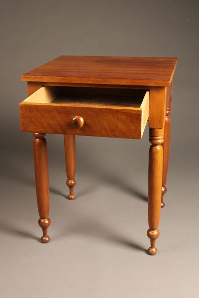 Very nice late 19th century cherry stand table with drawer and turned legs