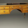 Lovely Kittenger writing desk in solid mahogany with black leather top and brass pulls