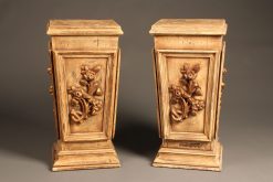 Pair of vintage wood pedestals with nicely carved details.