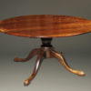 Custom made 18th century English styled farmhouse table in cherry wood with two 18" leaves.