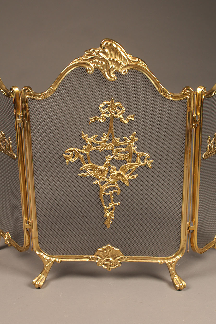 Antique solid brass folding fireplace screen with nice castings.