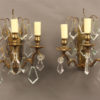 Pair of 3 arm bronze and crystal French sconces.