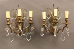 Pair of 3 arm bronze and crystal French sconces.