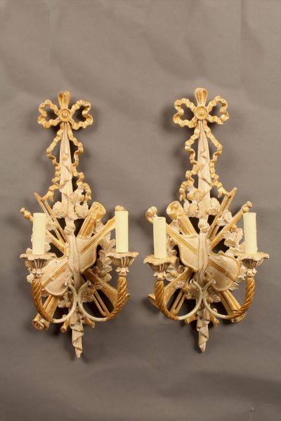 Pair of 2 arm hand carved Italian sconces with ribbon and musical instrument motif