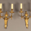 Pair of two arm French Louis XVI style bronze sconces.