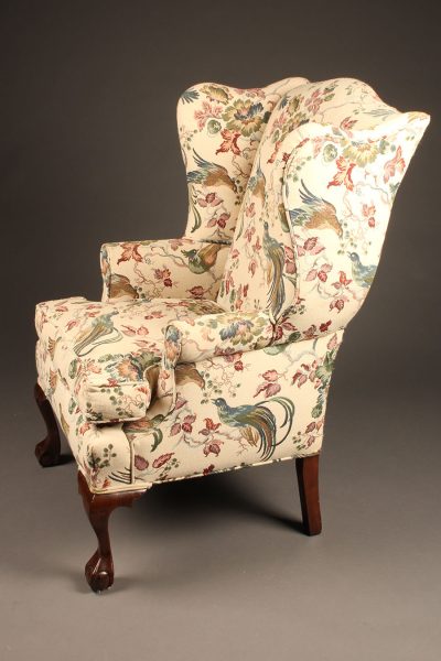 Chippendale style wingback arm chair with cabriole leg and ball and claw feet