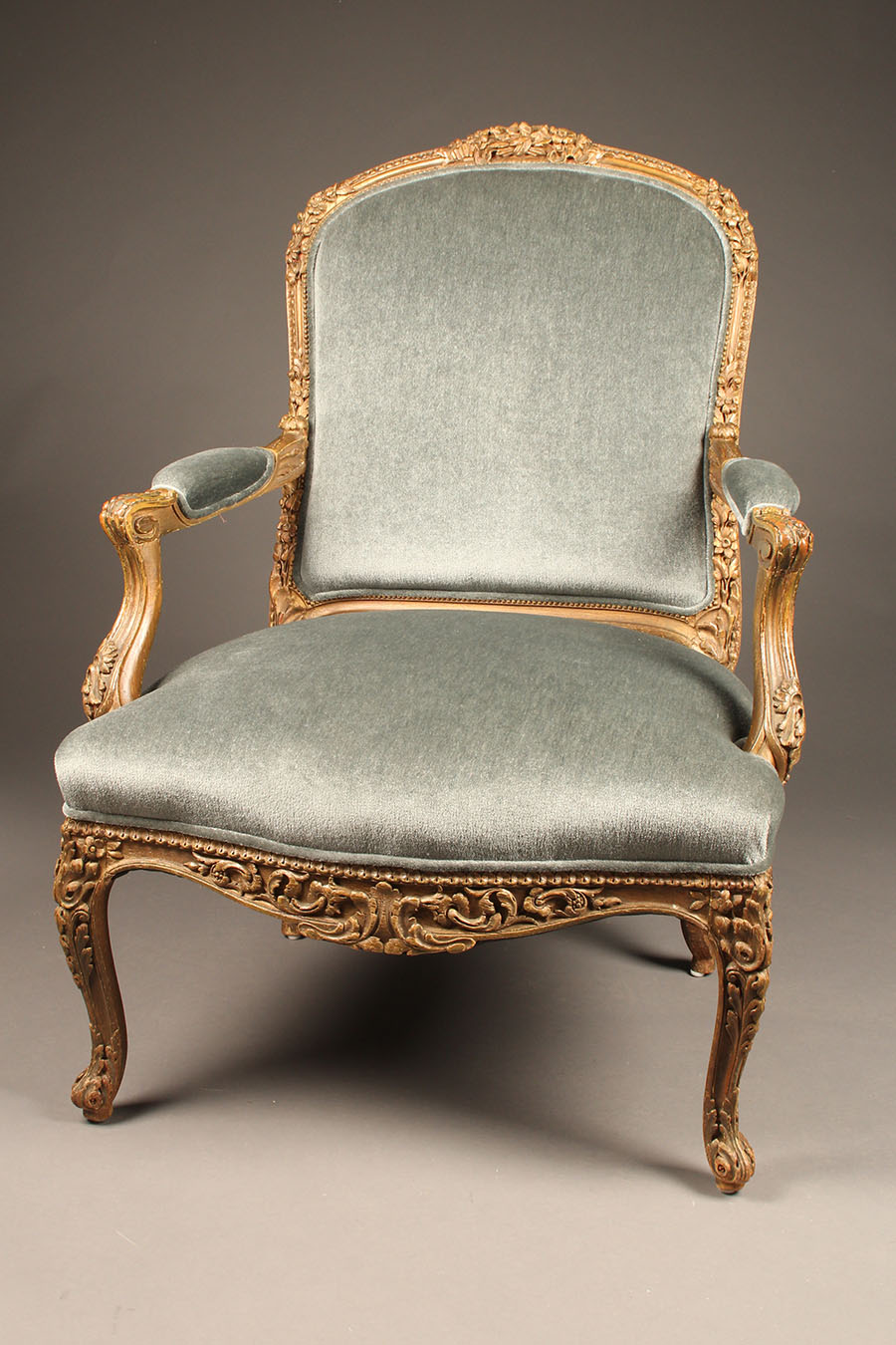 Antique pair of French Louis XV bergère chairs.