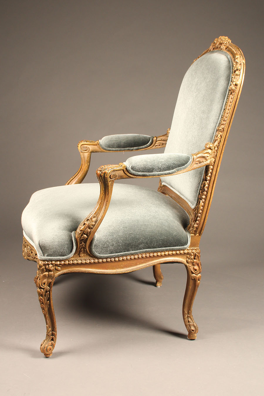 Antique pair of French Louis XV bergère chairs.