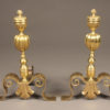 Beautiful pair of cast brass English andirons with fleur de lis