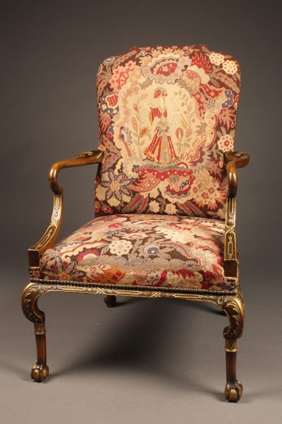 French walnut armchair with ball and claw feet, parcel gilt and handmade tapestry