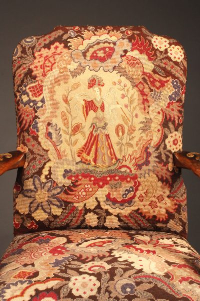 French walnut armchair with ball and claw feet, parcel gilt and handmade tapestry