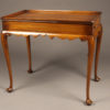 Wonderful mahogany tea table with slides on ends