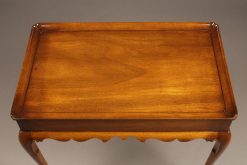 Wonderful mahogany tea table with slides on ends