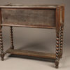 Early 20th century jardiniere in caned oak with liner and writhen legs
