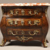 Rare miniature French Louis XV style bombe chest with marble top.