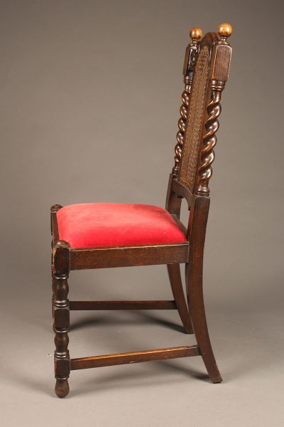 Set of 8 Jacobean style oak dining chairs with cane backs