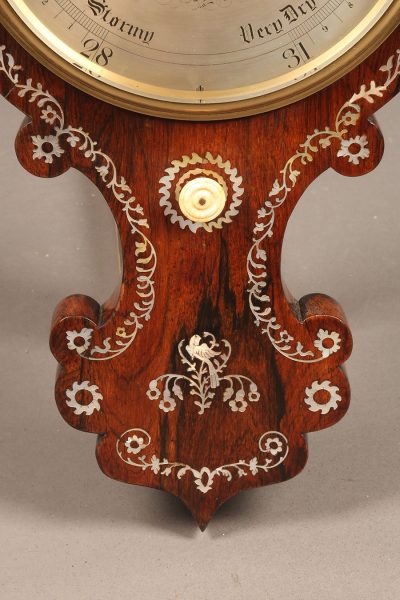 Late 19th century English barometer in rosewood with inlaid mother of pearl